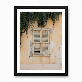 Shutters On A Yellow Wall France Art Print