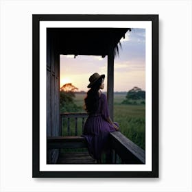 A Youthful Asian Woman Skillfully Encapsulated In Her Journeys Adventure Perched On A Weathered Wo (2) Art Print