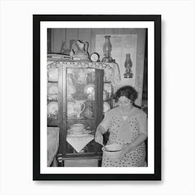 Mexican Woman Beating Cake In Front Of China Cupboard, San Antonio, Texas By Russell Lee Art Print