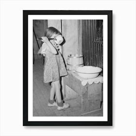 Josie, Daughter Of Faro Caudill, Drinking Water In Front Of Washstand, Pie Town, New Mexico By Russell Lee Art Print