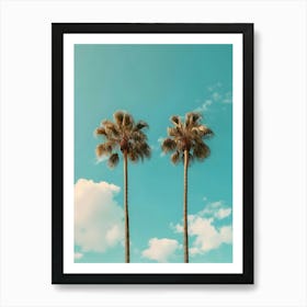 Two Palm Trees Against A Blue Sky Art Print