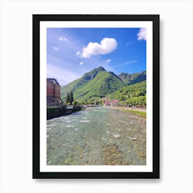 San Pellegrino terme rover from a bridge beautiful mountain in the background green mountain and a river clean water Art Print