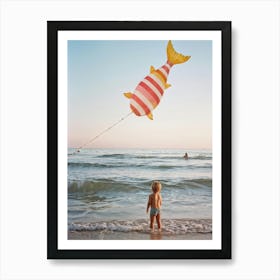 An Endearing Scene Of A Child Amused With A Weightless Oversized Candy Stripe Fish Floating Above (7) Art Print