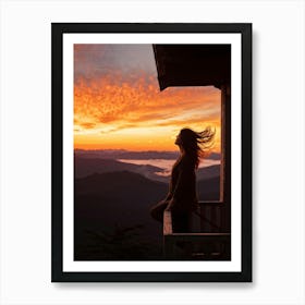 Woman Basking In Sunsets Glow On A Mountain Porch Silhouette Against A Sky Painted With Hues Of Or 2 1 Art Print