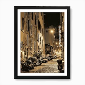 Cobblestone alleyway in an Italian city at night. The walls of the buildings lining the street are a warm, ochre color, and the windows are shuttered. The street is illuminated by a few streetlights, casting a warm glow on the scene. Art Print