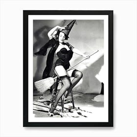 Young And Beautiful Witch Posing On A Broom In Studio Art Print