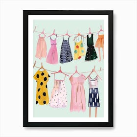 Children'S Clothes Hanging On Clothesline Art Print