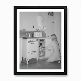 Wife Of Member Of The Arizona Part Time Farms, Chandler Unit, Maricopa County, Arizona, At Her Kitchen Stove By Russe Art Print