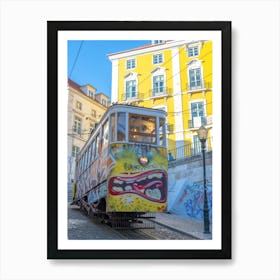 Bright yellow cable car with graffiti in Lisbon, Portugal - summer street and travel photography by Christa Stroo Photography Art Print