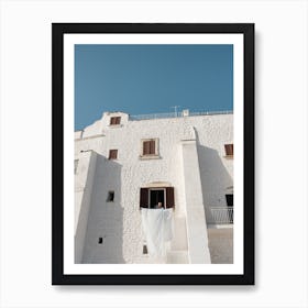 Italian man hanging out the washing Art Print