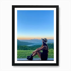 Woman Exuding A Sense Of Freedom While Sitting On A Wooden Porch Overlooking A Vast Hill And Sky Th (3) Art Print