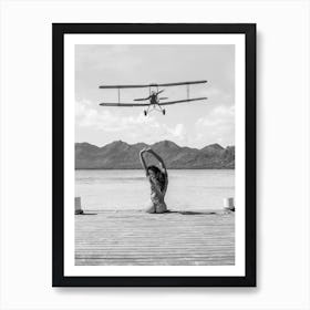 Woman on a Dock - Aircraft Coming In For An Island Landing Art Print