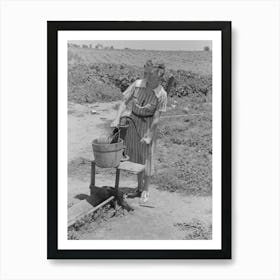 Daughter Of Sharecropper Pumping Water, New Madrid County, Missouri By Russell Lee Art Print