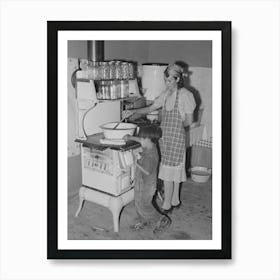 Spanish American Woman Stirring Pan Of Cooking Beans, Small Boy Is Roasting Sweet Corn On Top Of The Stove Art Print