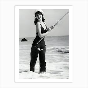 American Actor Ava Gardner Wearing A Bathing Suit And Waders While Standing In The Ocean Holding A Fishing Pole Art Print