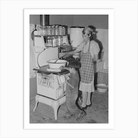 Spanish American Woman Stirring Pan Of Cooking Beans, Small Boy Is Roasting Sweet Corn On Top Of The Stove Art Print