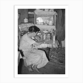Resident Of Tin Town, Caruthersville, Missouri, Sitting At Kitchen Table By Russell Lee Art Print