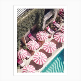 Pink Umbrellas By The Pool Art Print