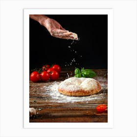 A Hand Stretching A Glistening Ball Of Pizza Dough Mid Action Flour Dusting In The Air From A Woode (2) Art Print