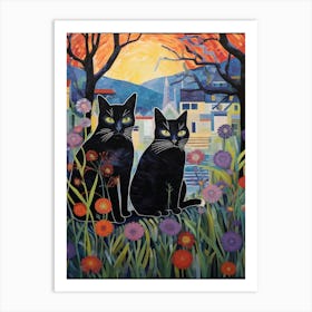 Two Black Cats In A Meadow With A City Scape Background Art Print