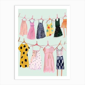 Children'S Clothes Hanging On Clothesline Art Print