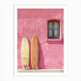 Two Surfboards Leaning Against A Pink Wall Art Print