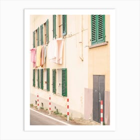 Florence, Italy I Street photography in pastel yellow summer colors in Fiesole village in Tuscany with its laundry drying in the window like la dolce vita of italian everyday daily life scene Art Print