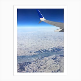 Plane ride over snowy land Art Print