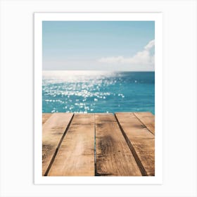 Wooden Table On The Beach Art Print