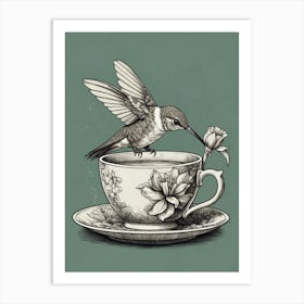 Hummingbird On A Teacup Art Print