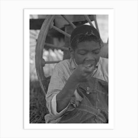 A Boy Eating Lunch By Wagon In Sugarcane Field Near New Iberia, Louisiana By Russell Lee Art Print