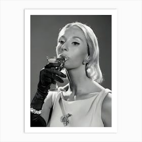 1960s Portrait Elegant Blond Woman Sipping Champagne Wearing Gown And Long Black Gloves Art Print