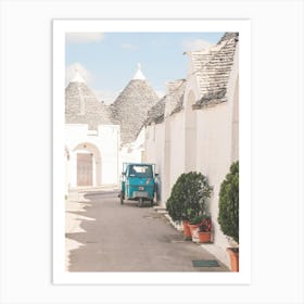 Puglia, Italy I Quiet street in Alberobello white village with trulli architecture and Vespa scooter in a retro vintage summer pastel aesthetic photography for living la dolce vita in the Mediterranean place Art Print