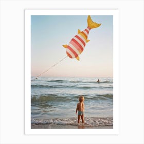 An Endearing Scene Of A Child Amused With A Weightless Oversized Candy Stripe Fish Floating Above (1) Art Print