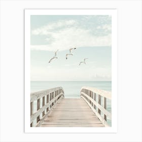 Seagulls Flying Over A Pier Art Print