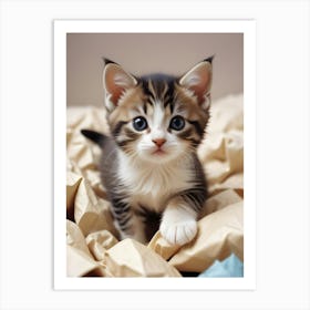 Kitten On A Bed Art Print