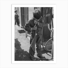 Mexican Migrant Boy Drinking Out Of Water Hose At Filling Station Where The Truck Which Is Taking Him Home From Art Print