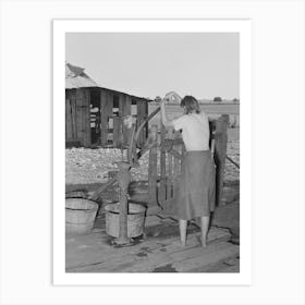 Daughter Of Tenant Farmer Living Near Muskogee, Oklahoma, Pumping Water Out Of Tub,See General Caption Number Art Print