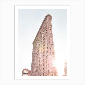 New York, USA I The Flatiron building in the sun with original and flat architecture between Broadway and 5th Avenue in a retro vintage postcard photography aesthetic atmosphere for a mythical NYC landmark Art Print