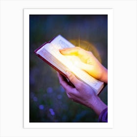 A Hand Gently Holding Open A Holy Bible To Highlight A Passage Surrounded By A Soft Glow That Sugge (2) Art Print