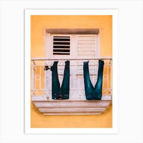 Jeans Drying From A Balcony Art Print