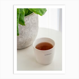 A scandinavian cup of tea with quote in Norway, Bergen in a white interior - winter hygge photography by Christa Stroo Photography Art Print