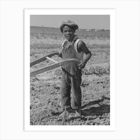 New Madrid County, Missouri,Child Of Sharecropper Cultivating Cotton By Russell Lee Art Print