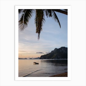 Boat on the water at sunset with palms Art Print