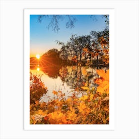 Sunset on lake water with tree at fall season Art Print