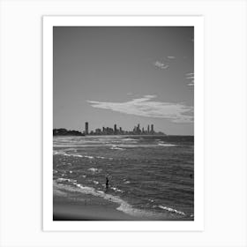 Black And White Beachscape With Gold Coast City Skyline In The Background. Swimmers In The Water On The Beach Art Print