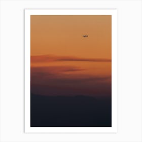 Airplane In The Sky At Sunset Art Print