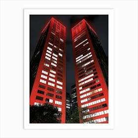 Two Buildings Lit Up In Red Art Print