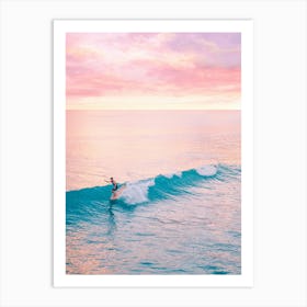 Surfer Riding A Wave At Sunset Art Print