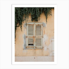 Shutters On A Yellow Wall France Art Print